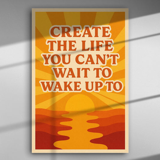 Motivational canvas print with sunrise and text 'Create the life you can't wait to wake up to'.