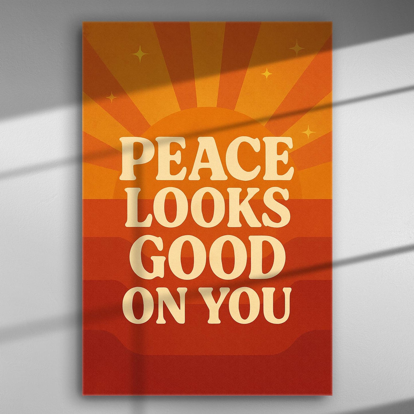 Canvas print with sunset background and the phrase 'Peace Looks Good On You' in bold letters.