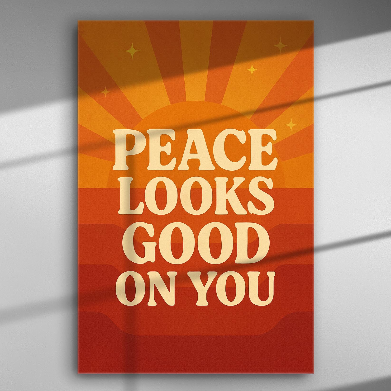 Canvas print with sunset background and the phrase 'Peace Looks Good On You' in bold letters.