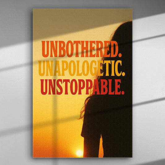 Canvas print with silhouette and inspiring words in bold letters against a sunset background.