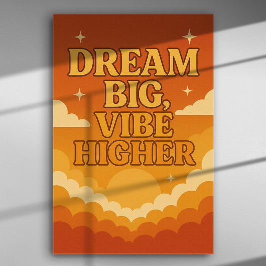 Canvas print with the motivational phrase 'Dream Big, Vibe Higher' in orange and yellow tones.
