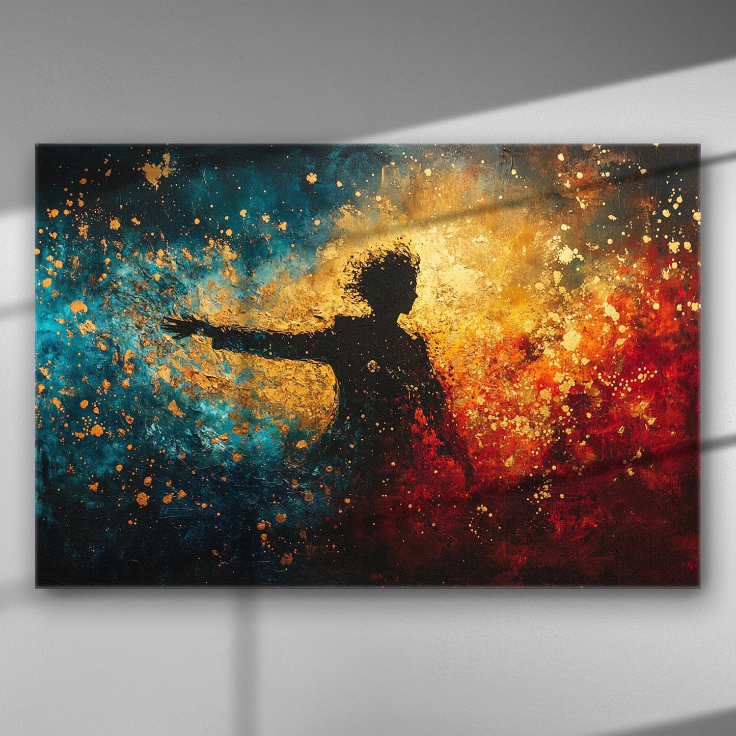Silhouette of a person dancing against a background of vibrant blue, red, and golden splashes.