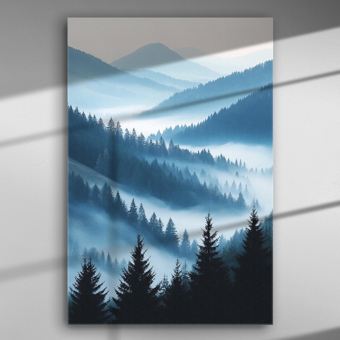 Canvas print featuring a misty mountain landscape with layers of trees and fog.