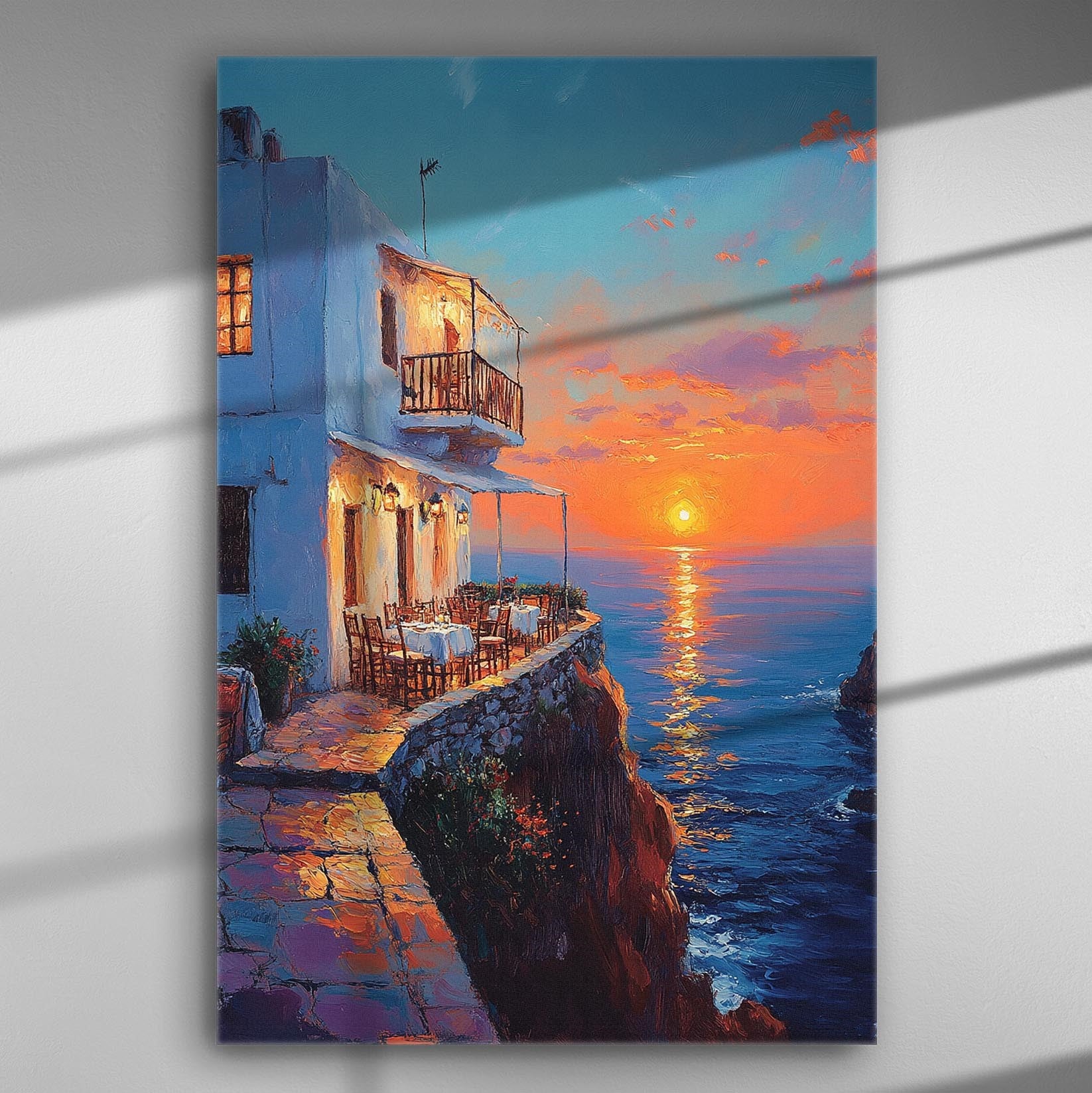 Sunset over the sea canvas print with vivid colors and a seaside terrace.