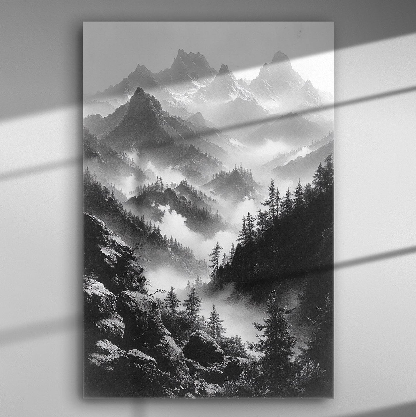 Black and white mountain landscape with mist, trees, and dramatic peaks, captured on a canvas print.