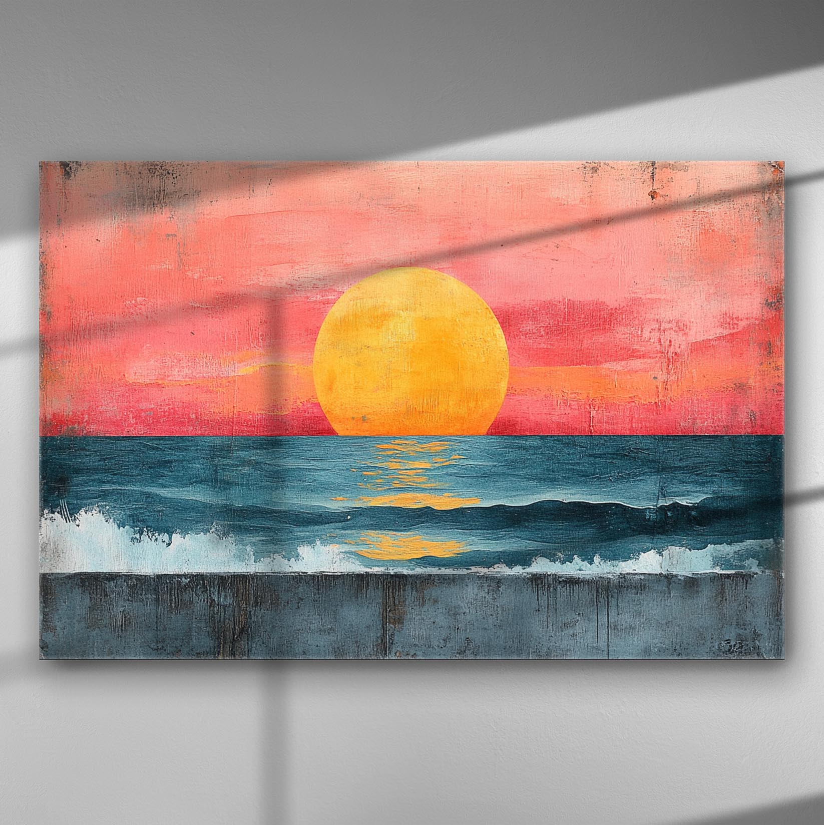 A canvas print depicting a sunset with a yellow sun setting over an ocean with vibrant orange and red skies.