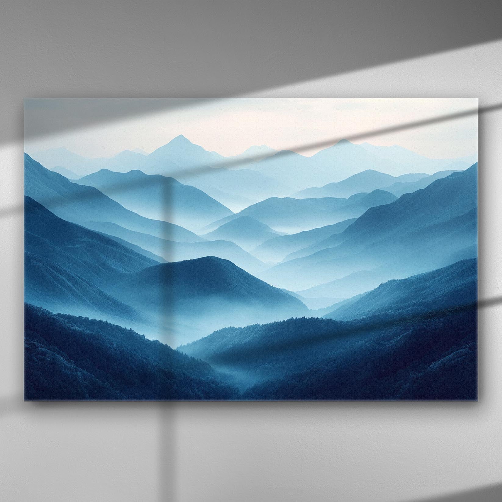 Scenic view of a serene mountain range in blue hues captured on a canvas print.