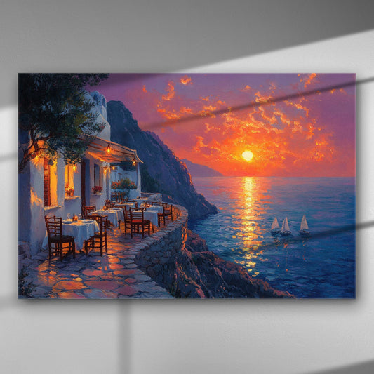 Canvas art print of a sunset over the sea with a cliffside restaurant, featuring vibrant colors and sailboats on the water.
