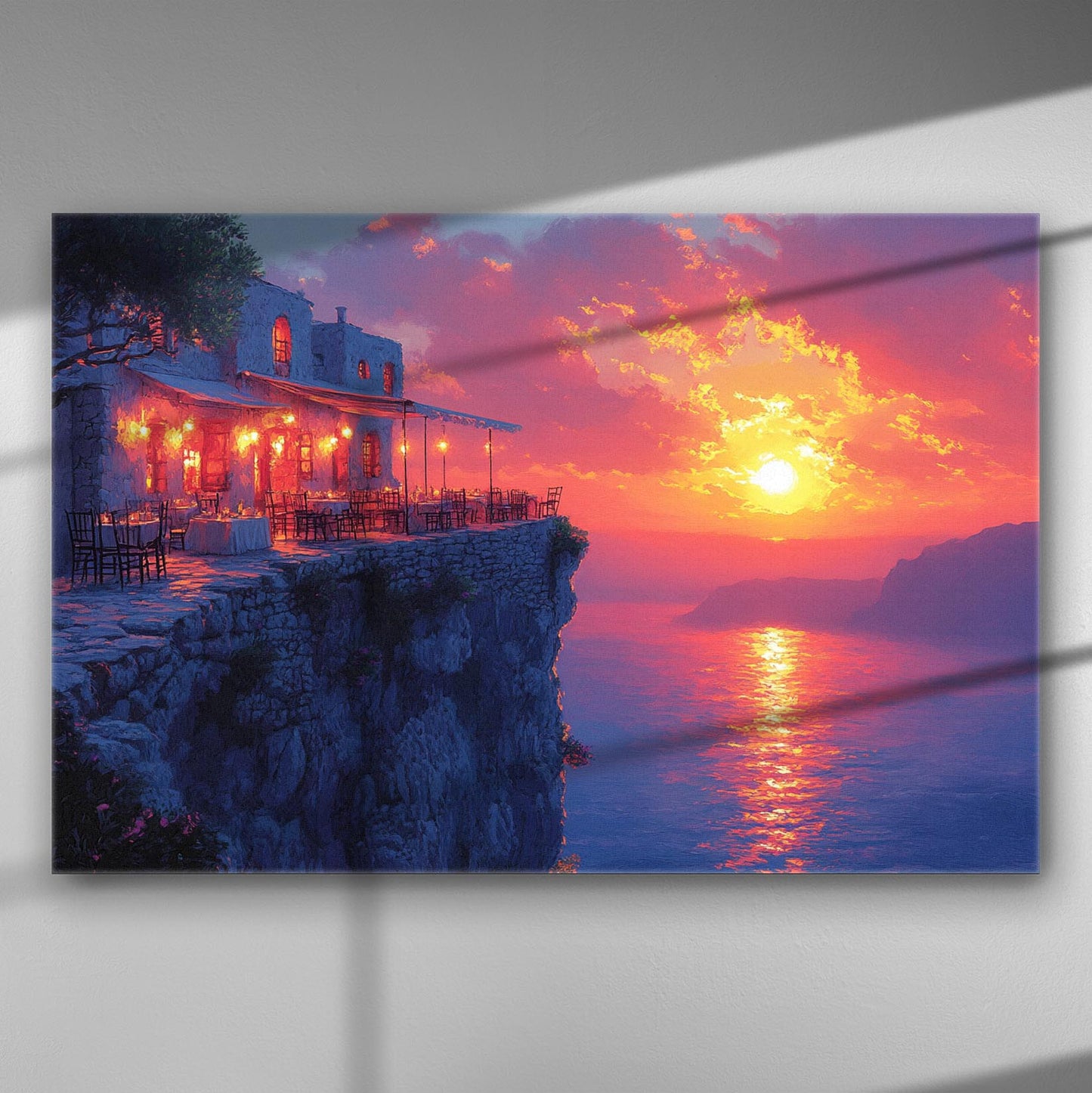 Sunset over a sea cliff cafe with glowing lights, vibrant sky reflecting on the water.