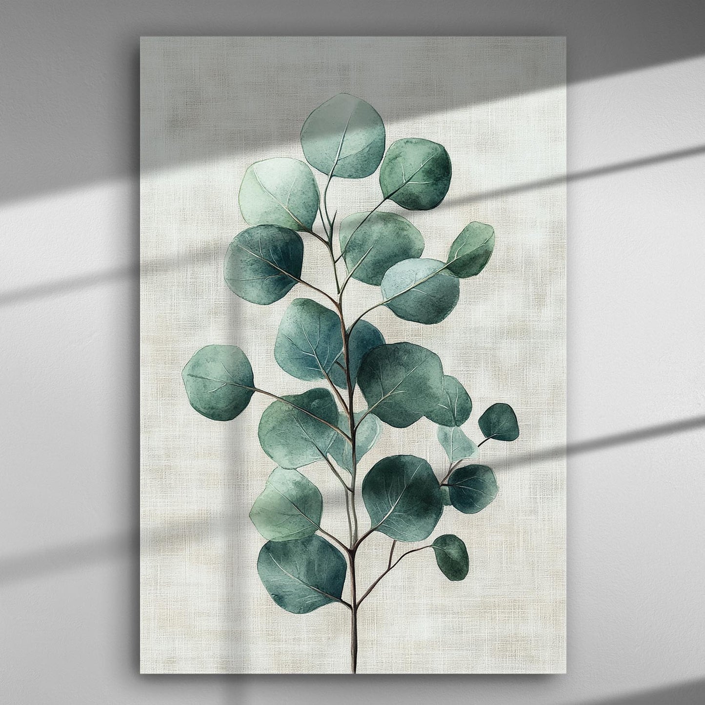Canvas print of green leaves on a light background.