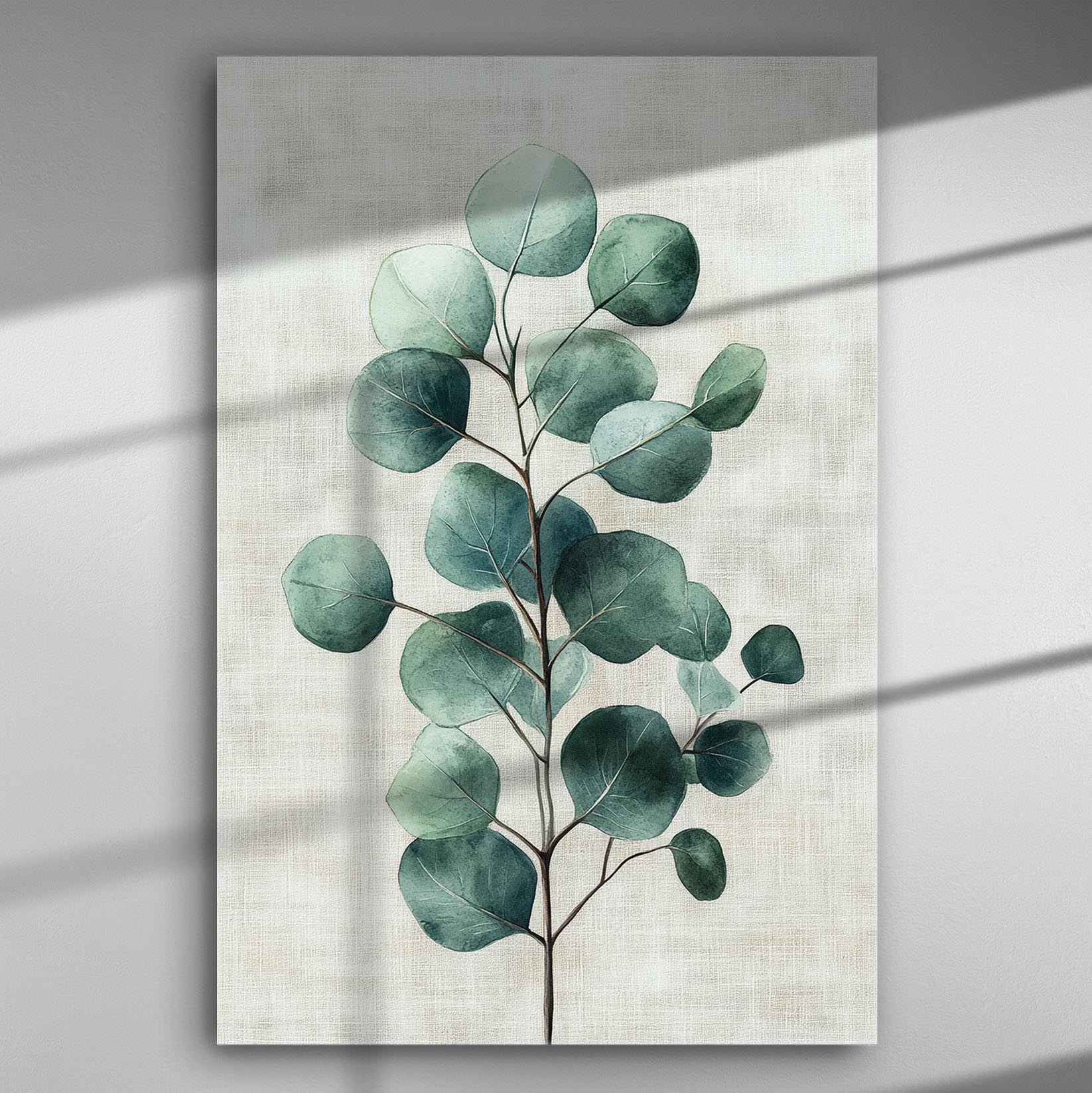 Canvas print of green leaves on a light background.