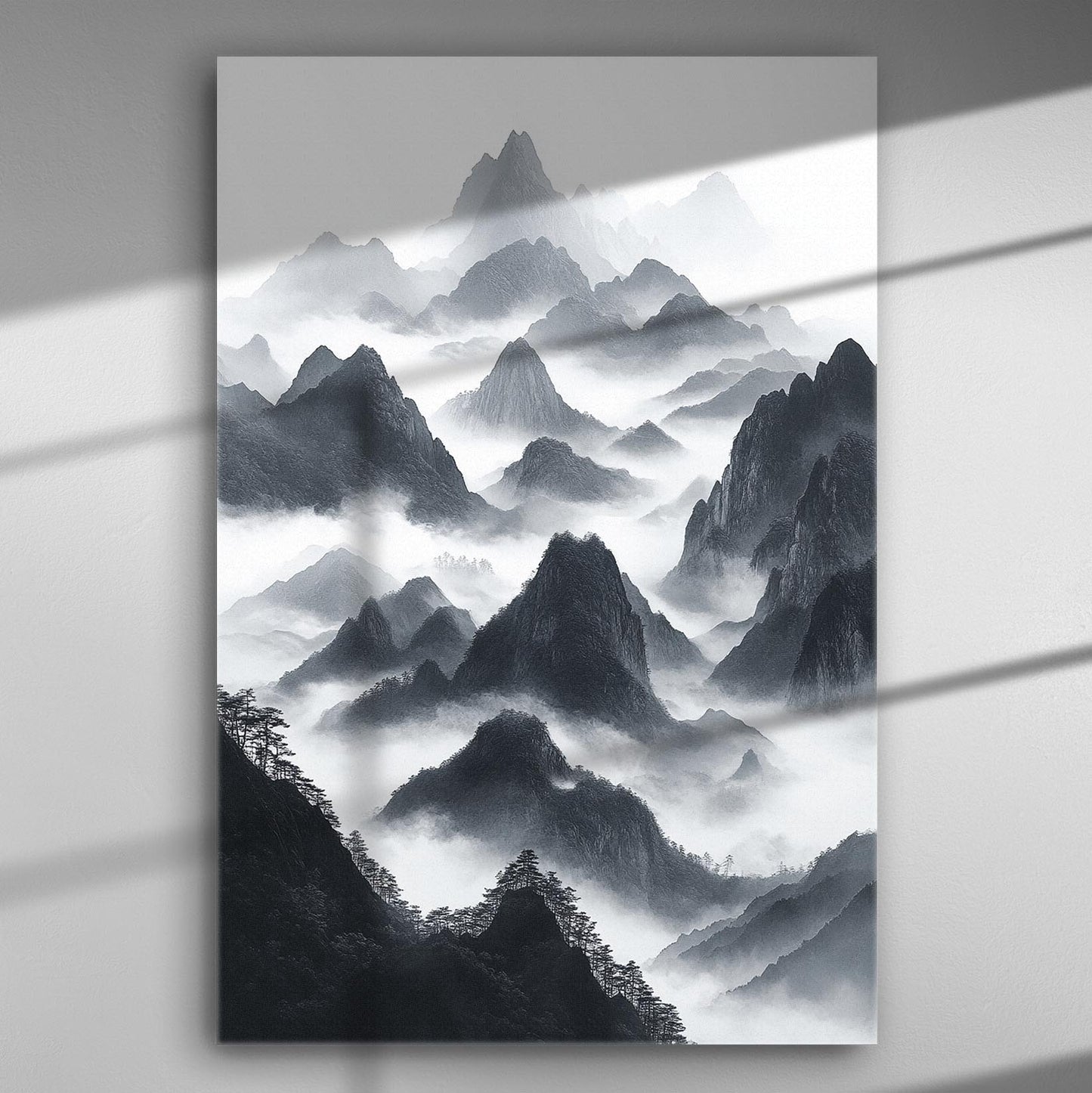 A black and white canvas print depicting misty mountain ranges with layers of fog.