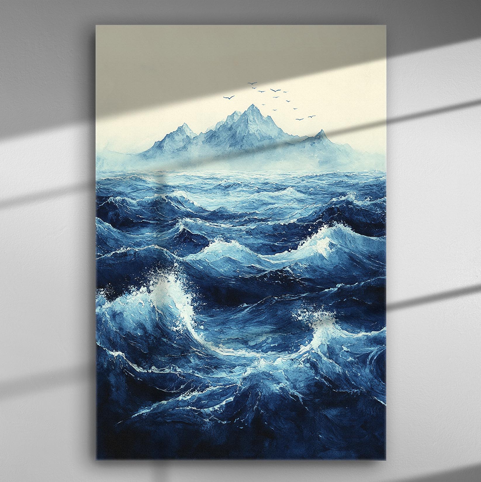 Ocean waves with distant mountains on a canvas print.