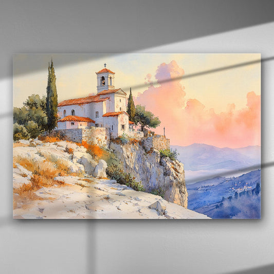 A picturesque sunset over a church on a rocky hill, displaying shades of pink and orange.