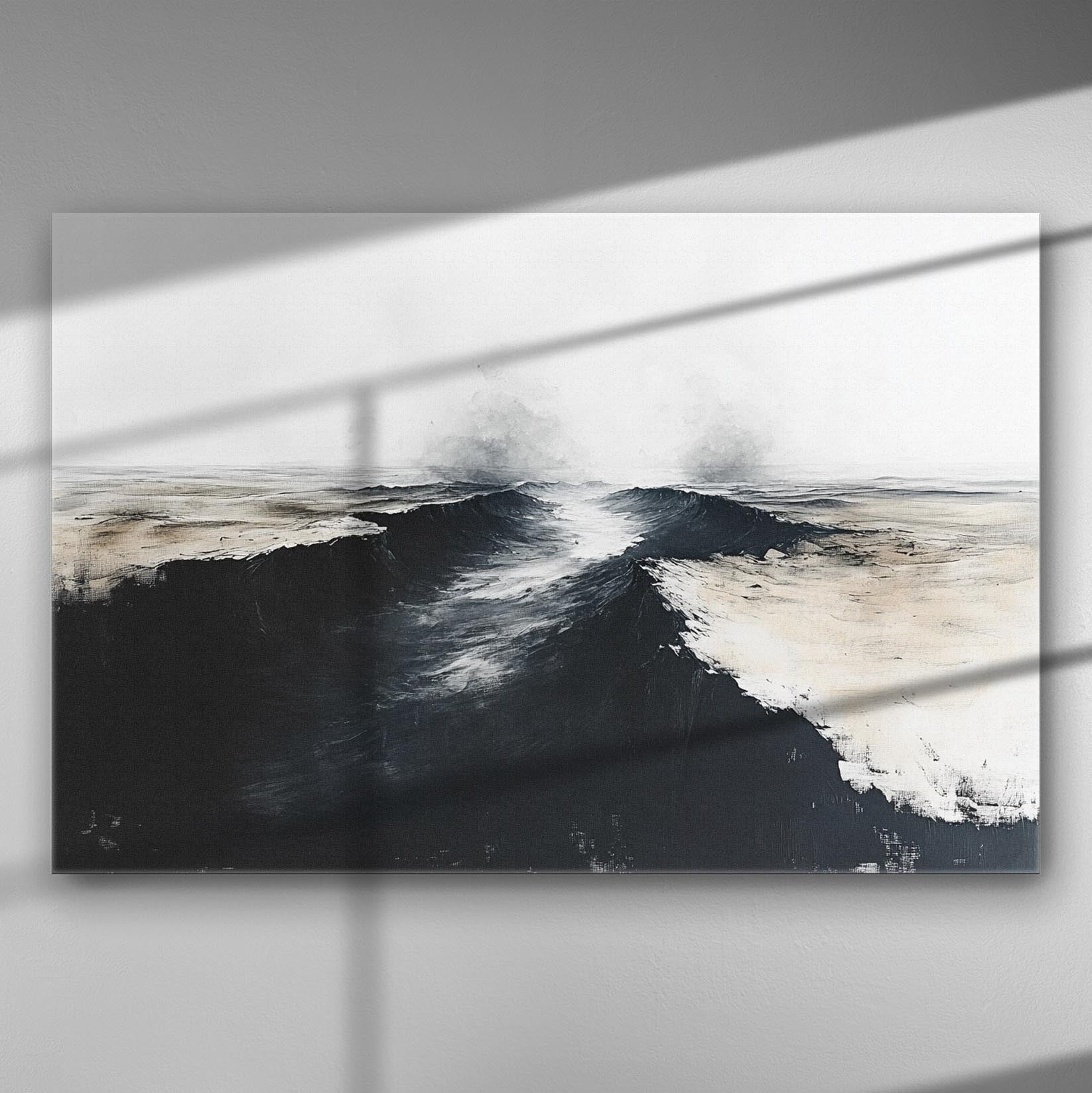 Abstract black and white painting of ocean waves on a canvas, conveying movement and depth.