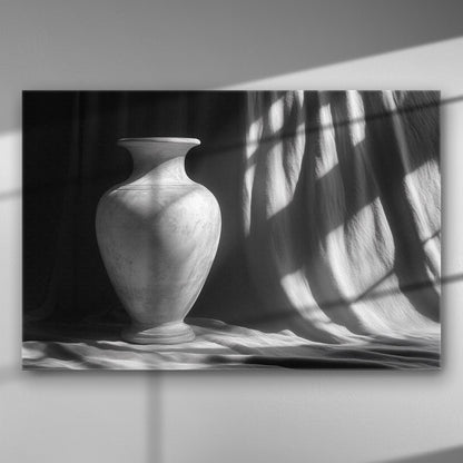 Black and white canvas print of a vase with dramatic shadows