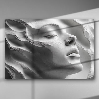 A sculptural profile of a woman's face in high detail, casting soft shadows on a canvas.