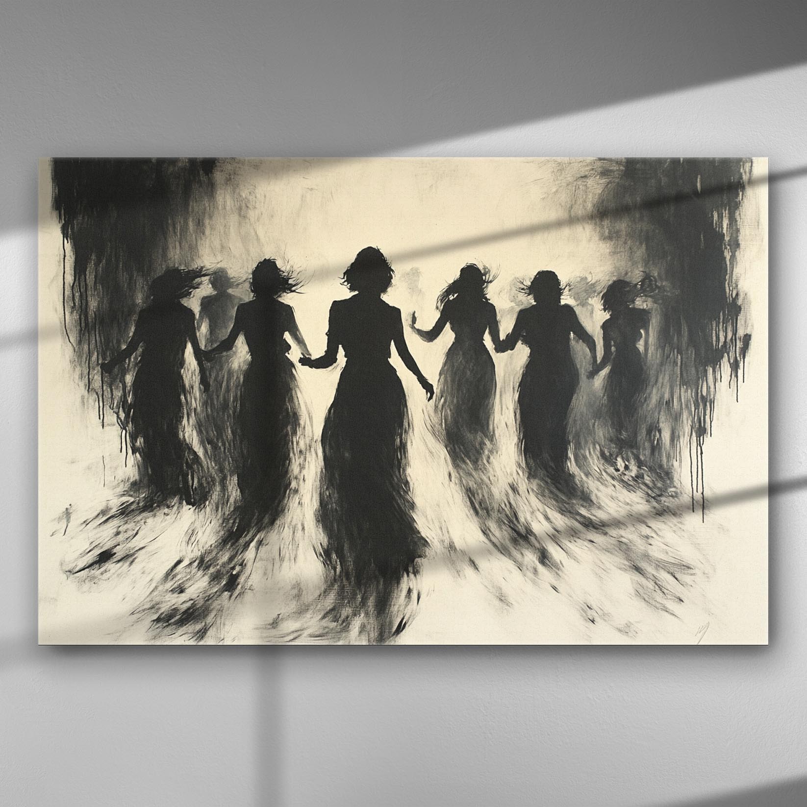 Silhouettes of women dancing, creating a mysterious and etheral scene in black and white.