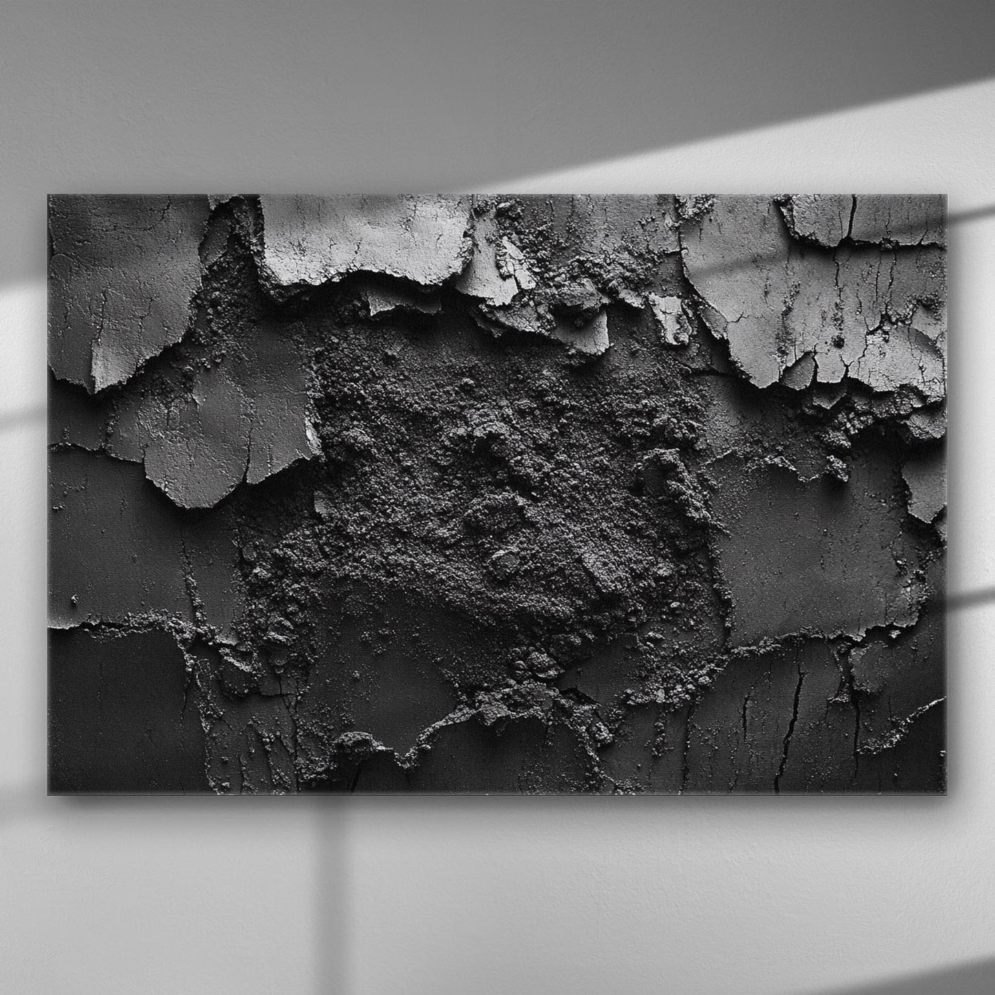 Abstract artwork showcasing cracked, peeling black paint texture on canvas with dramatic lighting.