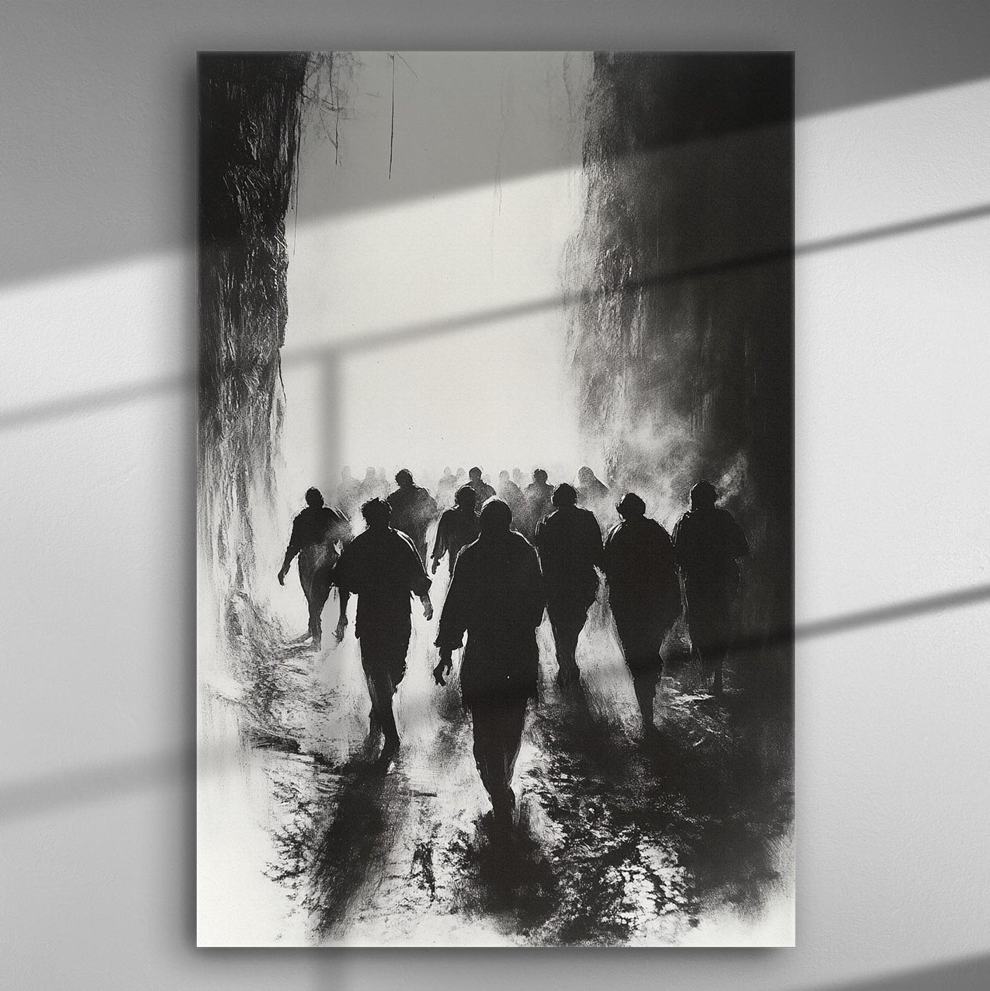 Silhouettes of people walking from darkness into light in a monochrome artwork.