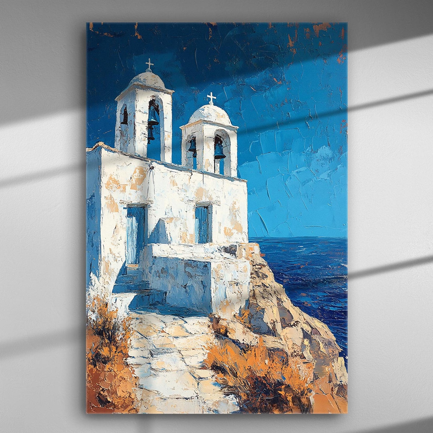 Canvas art depicting white domed structures with bell towers on a cliff overlooking the Aegean Sea.