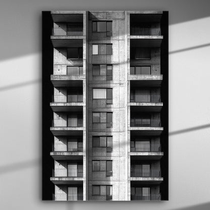 Black and white photograph of a modern residential building facade.