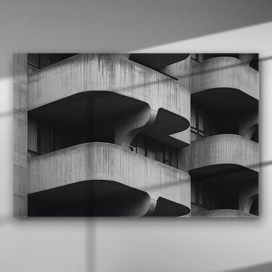 Black and white geometric architectural image with curved concrete balconies creating a bold pattern.