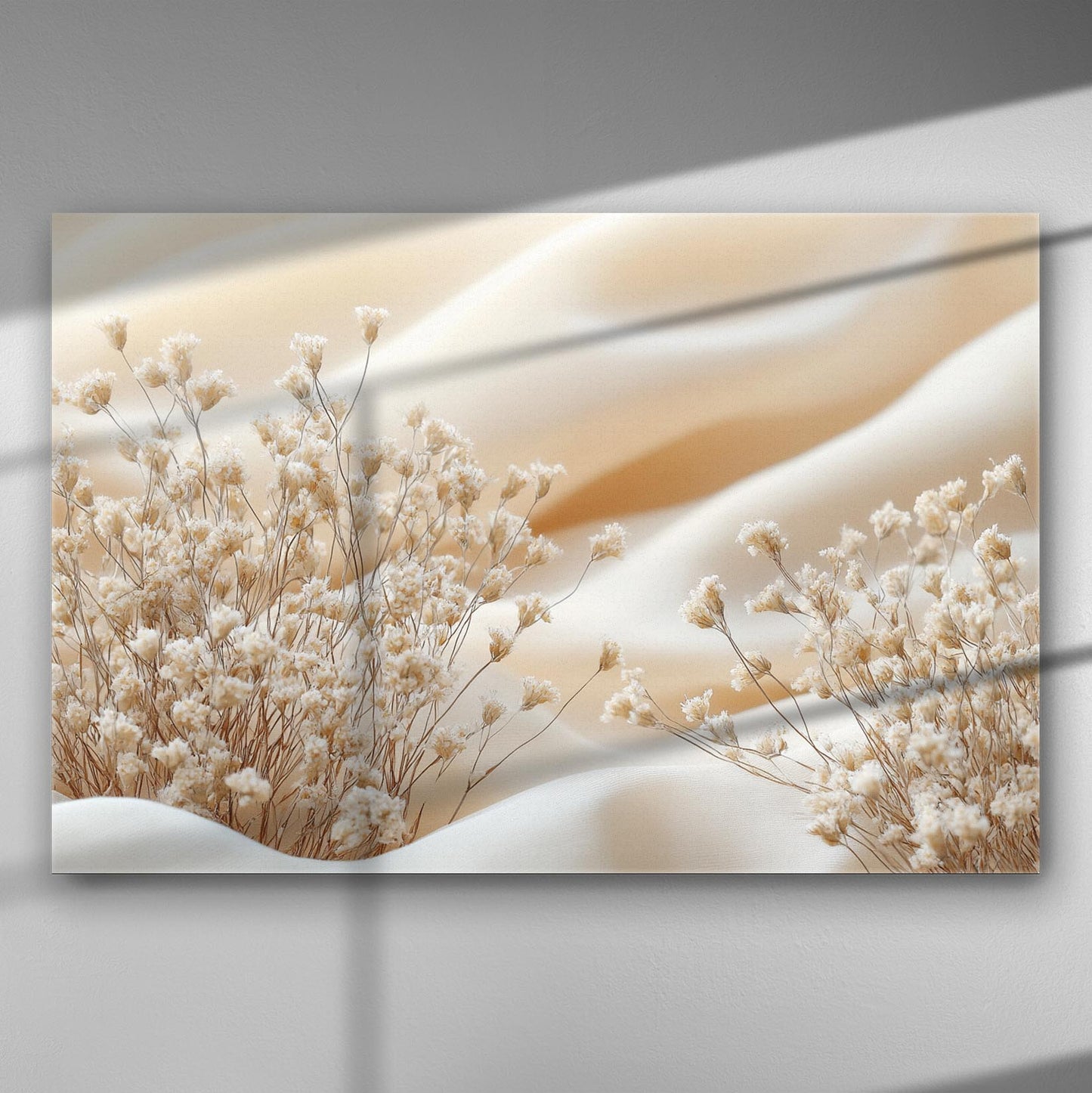 Canvas print featuring gentle desert waves with delicate earthy plants contrasting the soft sand.