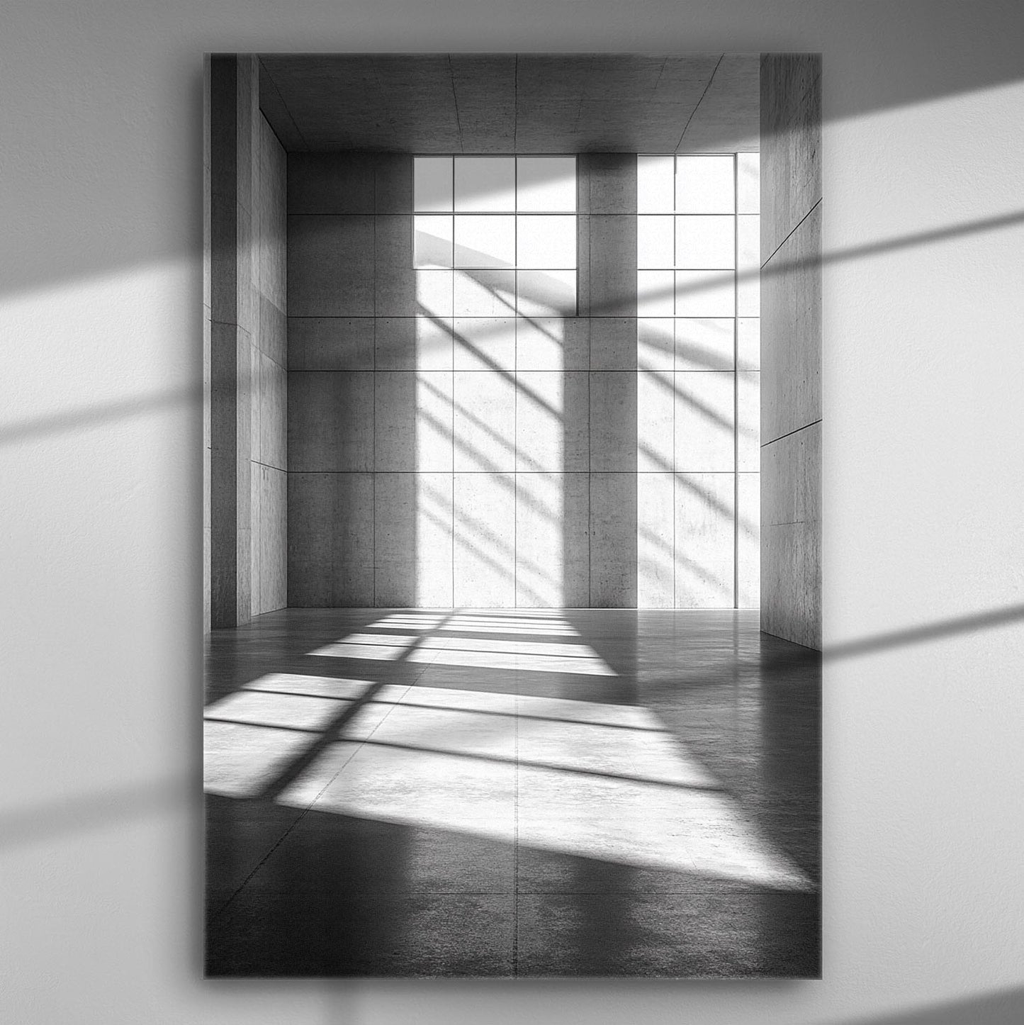 Abstract interior with geometric shadows cast by sunlight through a large window.