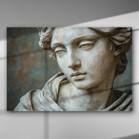 Close-up of a classical Greek sculpture's face on a canvas print, highlighting serene beauty and detailed artistry.