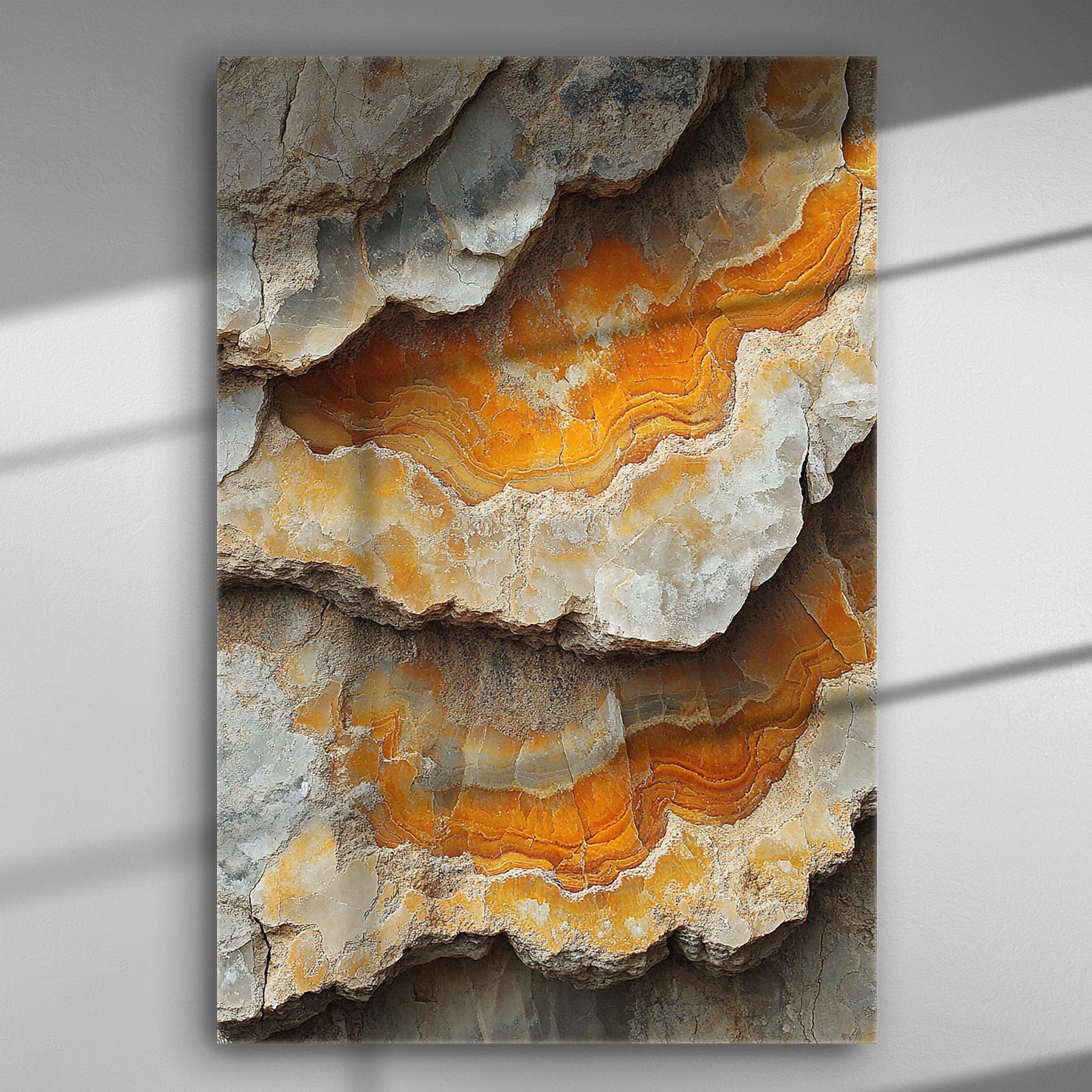 Close up of geological layers in orange and gray hues on canvas print.