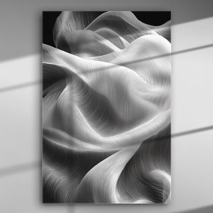 Flowing white fabric creating wave-like patterns in black and white canvas art.