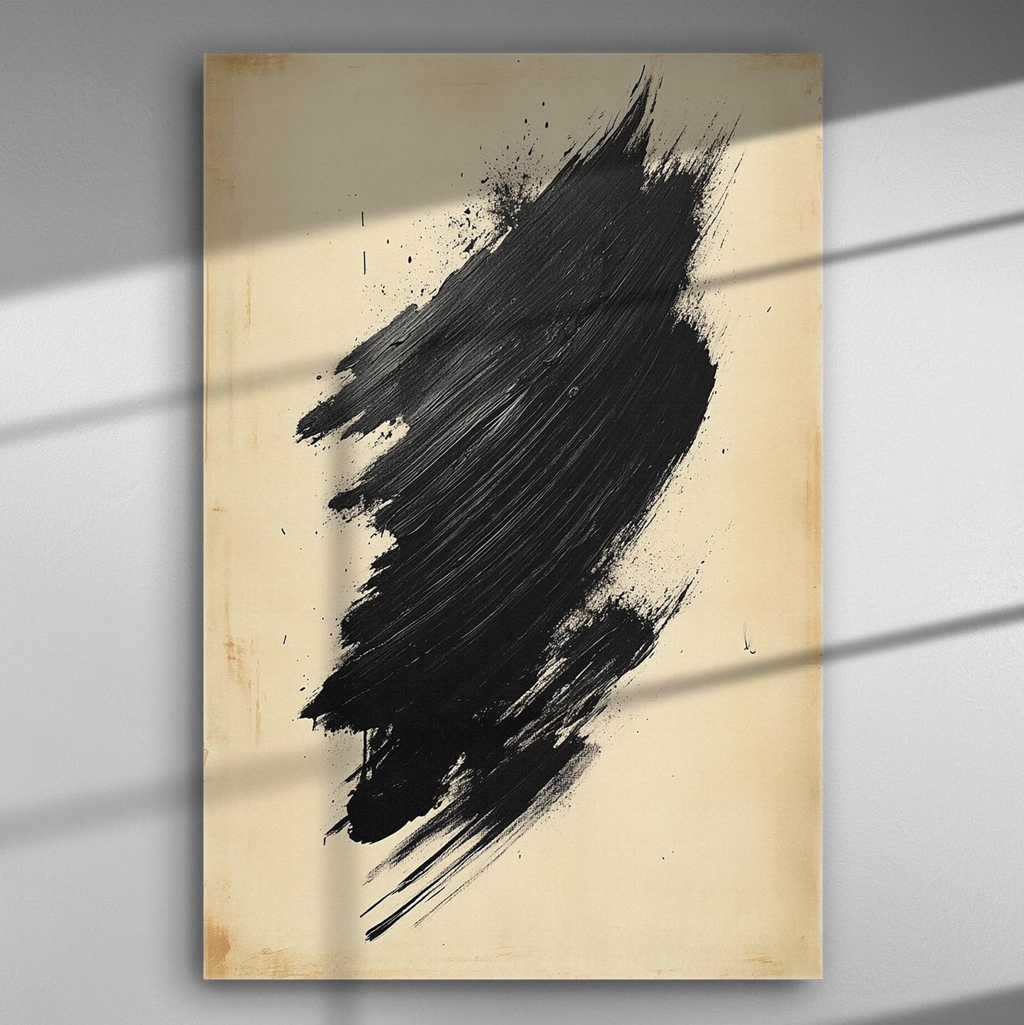 Abstract black brush stroke on a beige canvas background with artistic splatters.