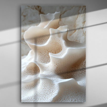 Abstract close-up of wavy, textured formations resembling a natural pattern in soft, beige tones.