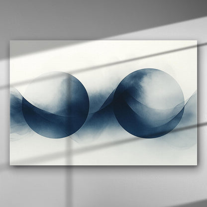 Abstract blue spheres on a canvas with soft lines and shadows.