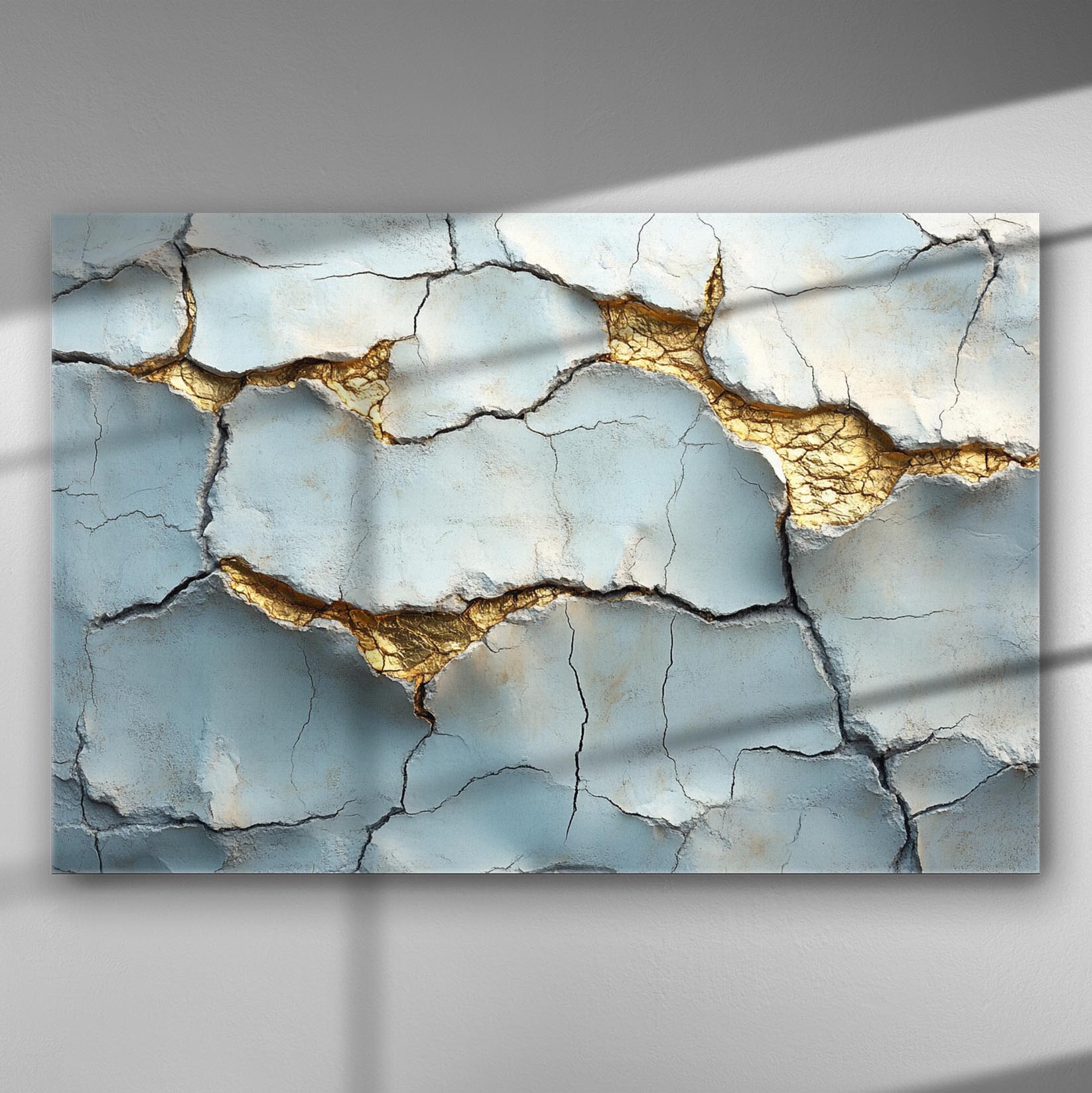 Canvas print showcasing blue surface with golden cracks resembling the Kintsugi art style, perfect for elegant home decor.