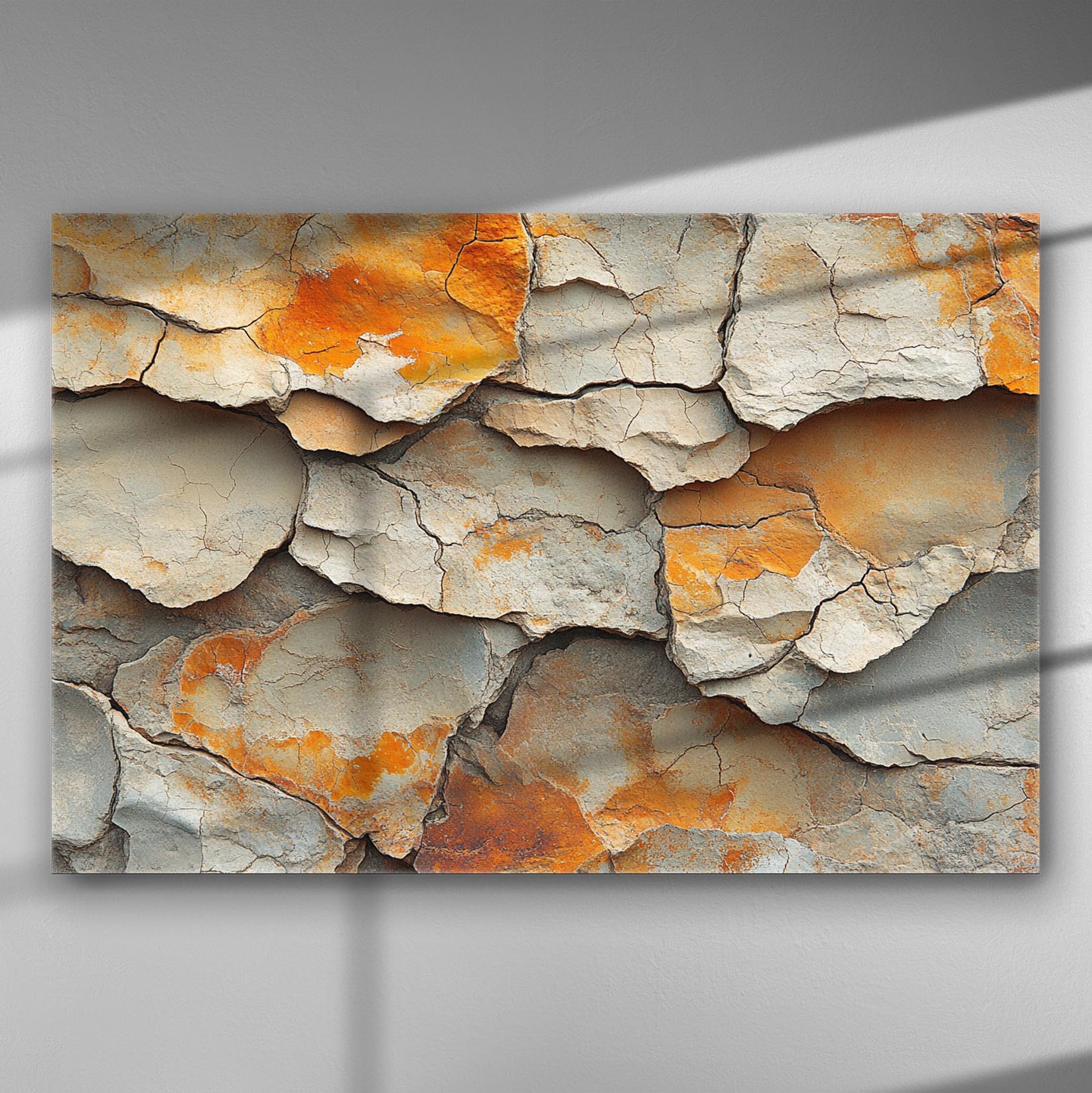 Cracked earth with orange and grey tones on a canvas print for rustic and modern spaces.