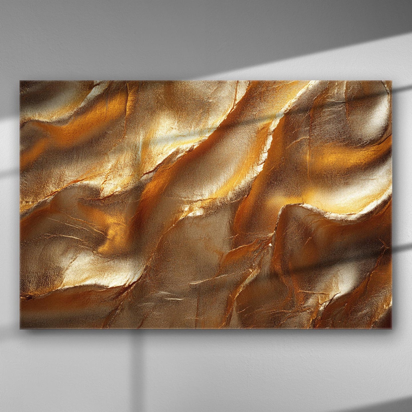 Abstract painting with golden and copper swirls on a canvas.