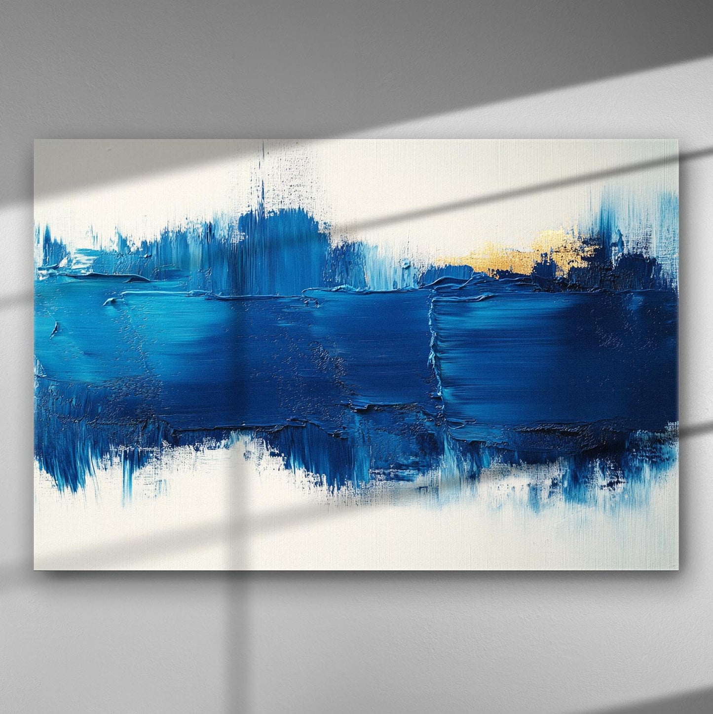 Abstract painting with bold blue and gold brushstrokes on canvas.