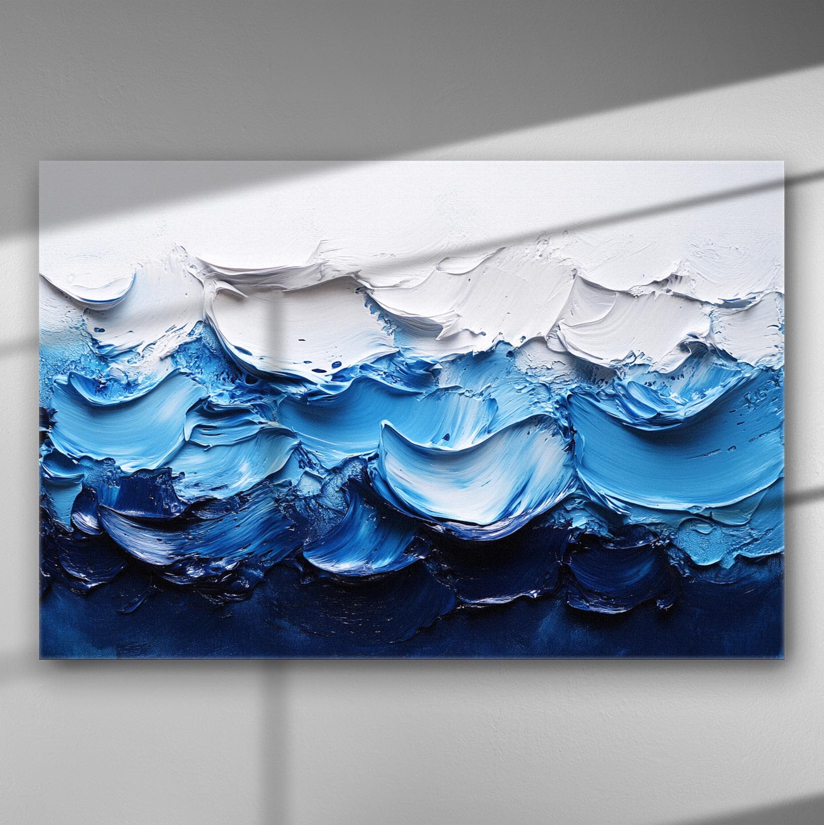 Abstract waves in white and blue hues on a canvas painting.
