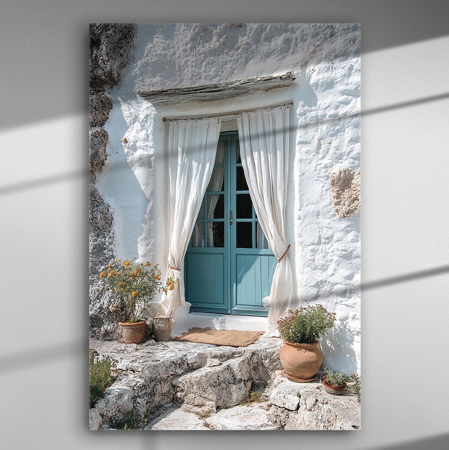 Canvas print of a traditional blue door surrounded by white walls and flowers, evoking the serene atmosphere of a Greek island.