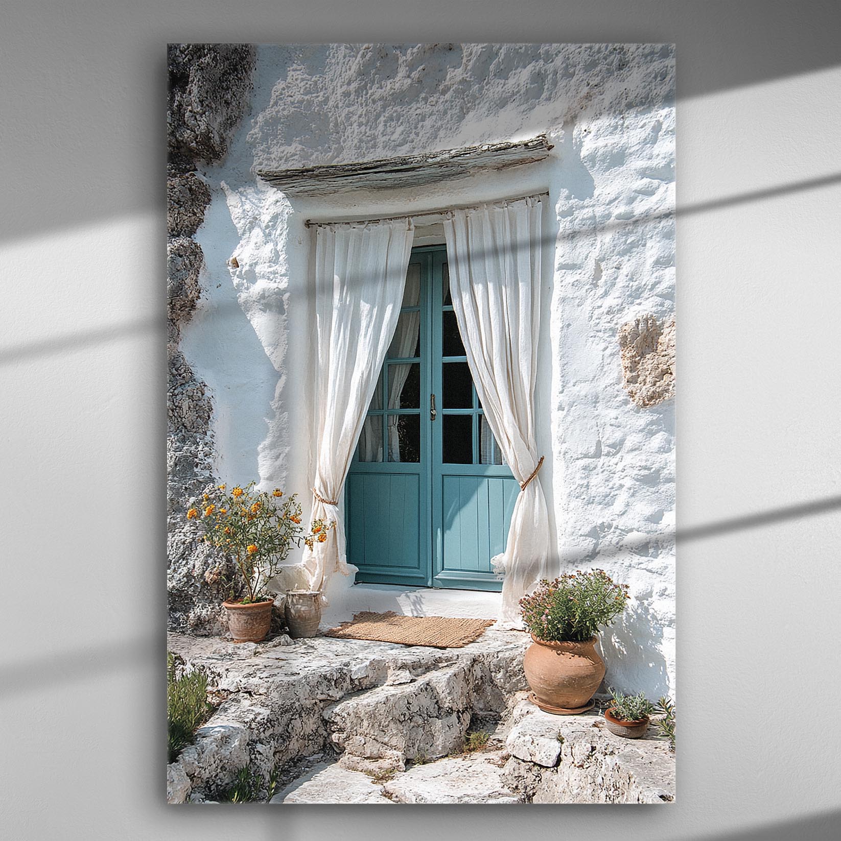 Canvas print of a traditional blue door surrounded by white walls and flowers, evoking the serene atmosphere of a Greek island.