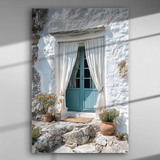 Canvas print of a traditional blue door surrounded by white walls and flowers, evoking the serene atmosphere of a Greek island.