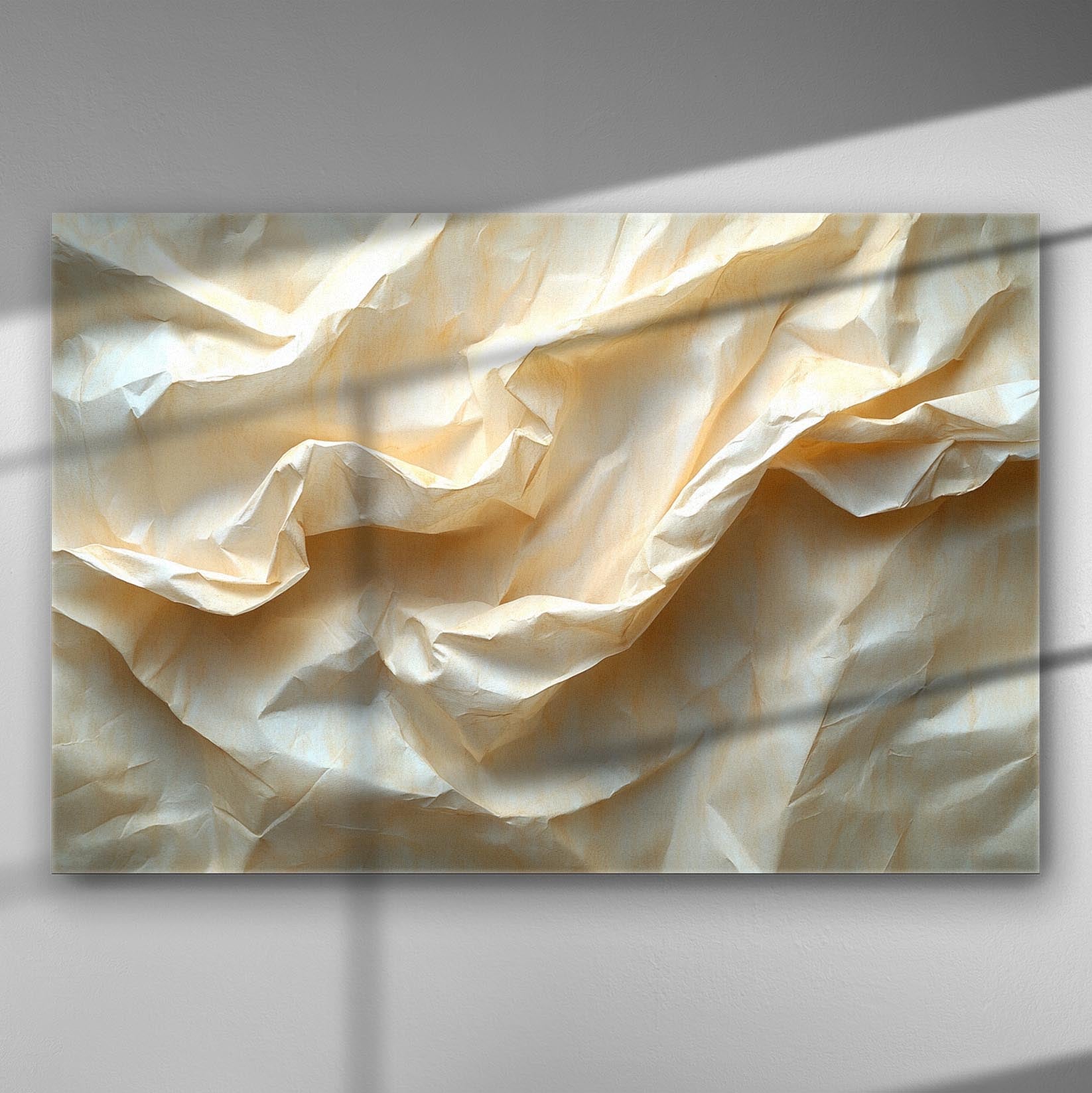 Abstract representation of crumpled paper with soft lighting on a canvas.